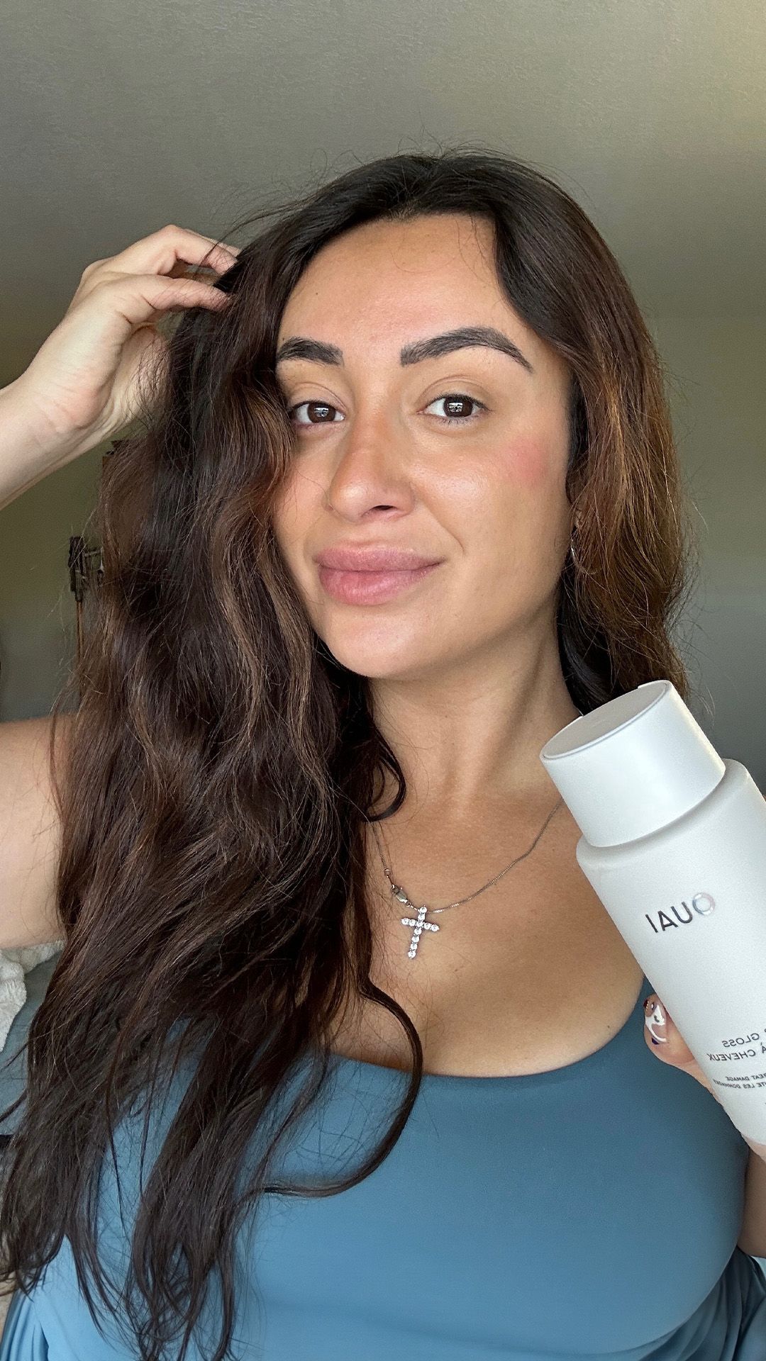 Angela Trakoshis after applying Ouais Hair Gloss